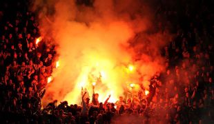 Ukraine fans light flares at the Dnipro Arena during qualification for the 2010 World Cup